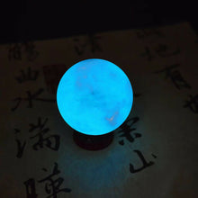 Load image into Gallery viewer, 35MM Blue Luminous Quartz Crystal Sphere Ball Glow In The Dark Stone With Base
